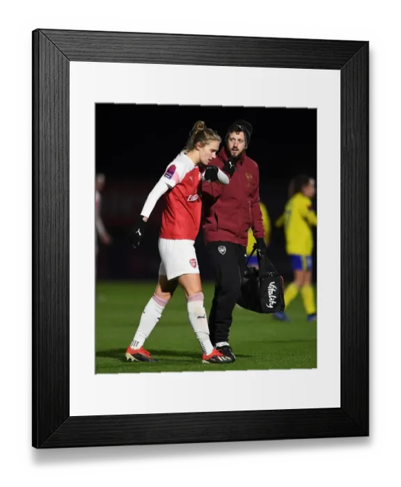 Framed Print : Arsenal Women: Vivianne Miedema Receives Medical Attention from Physio Sam Blanchard during FA WSL Match