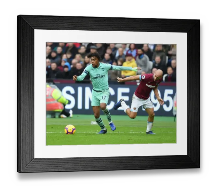 Framed Print : Alex Iwobi's Slick Moves: Outsmarting Zabaleta in Arsenal's Thrilling Premier League Victory Framed Print : Alex Iwobi's Slick Moves: Outsmarting Zabaleta in Arsenal's Thrilling Premier League Victory