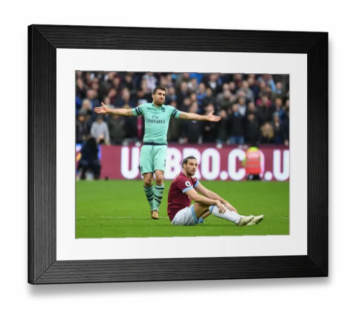 Framed Print : Sokratis Plea: A Tense Moment in the West Ham vs Arsenal Clash