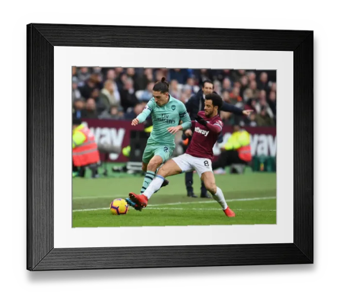 Framed Print : Clash at London Stadium: Hector Bellerin vs. Felipe Anderson - West Ham United vs. Arsenal FC, Premier League