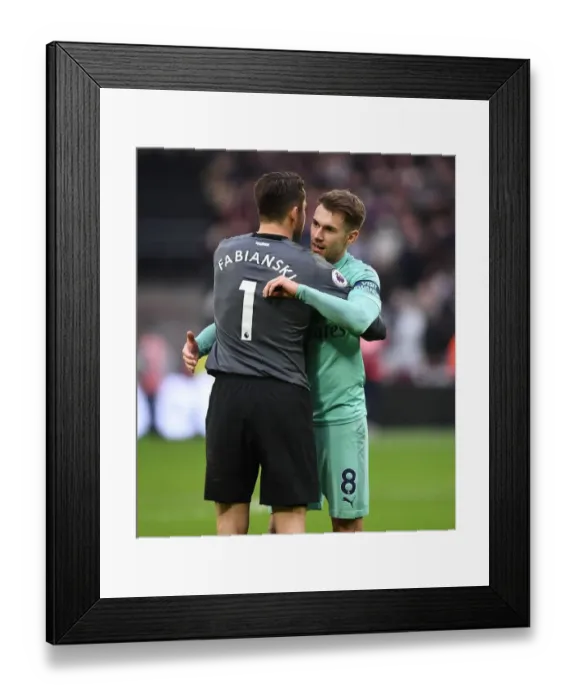 Framed Print : Ramsey Embraces Former Teamskeeper Fabianski: West Ham vs Arsenal, Premier League 2018-19 Framed Print : Ramsey Embraces Former Teamskeeper Fabianski: West Ham vs Arsenal, Premier League 2018-19