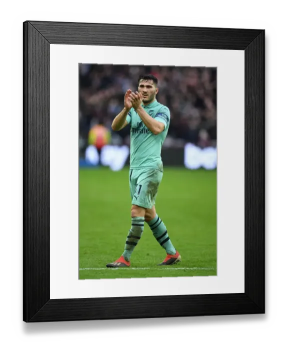 Framed Print : Arsenal's Sead Kolasinac Celebrates with Fans after West Ham Victory Framed Print : Arsenal's Sead Kolasinac Celebrates with Fans after West Ham Victory