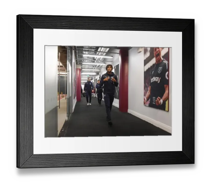 Framed Print : Arsenal's Alex Iwobi Heads to the Changing Room before West Ham Clash