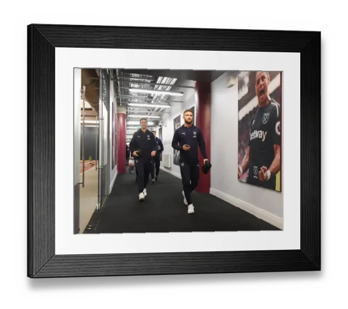 Framed Print : Arsenal Players Laurent Koscielny and Shkodran Mustafi Heading to Changing Room before West Ham United vs Arsenal FC (2018-19) Framed Print : Arsenal Players Laurent Koscielny and Shkodran Mustafi Heading to Changing Room before West Ham United vs Arsenal FC (2018-19)