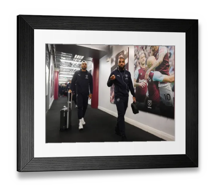 Framed Print : Arsenal Stars Aubameyang and Lacazette Head to Changing Room Before West Ham Showdown (2018-19)