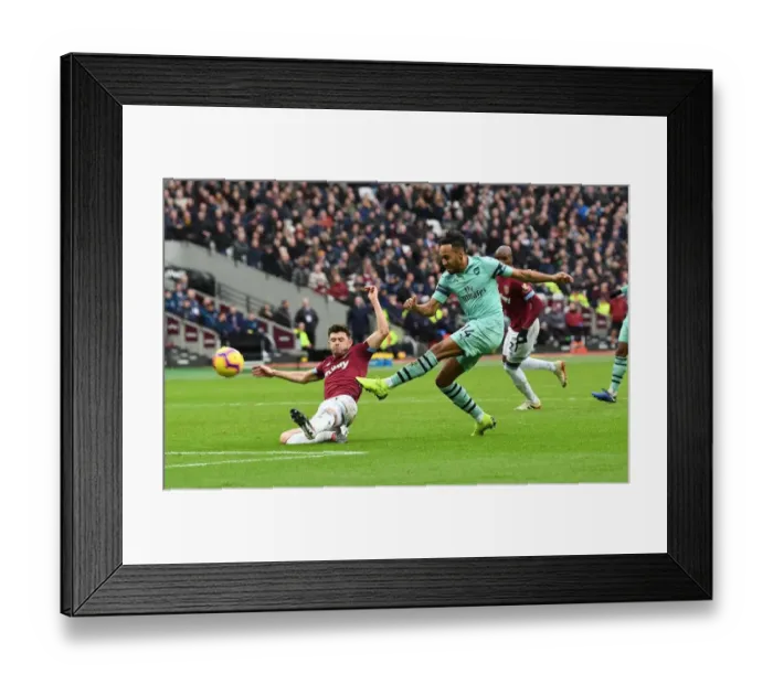 Framed Print : Aubameyang vs. Cresswell: Intense Moment from the West Ham United vs. Arsenal FC Premier League Clash Framed Print : Aubameyang vs. Cresswell: Intense Moment from the West Ham United vs. Arsenal FC Premier League Clash