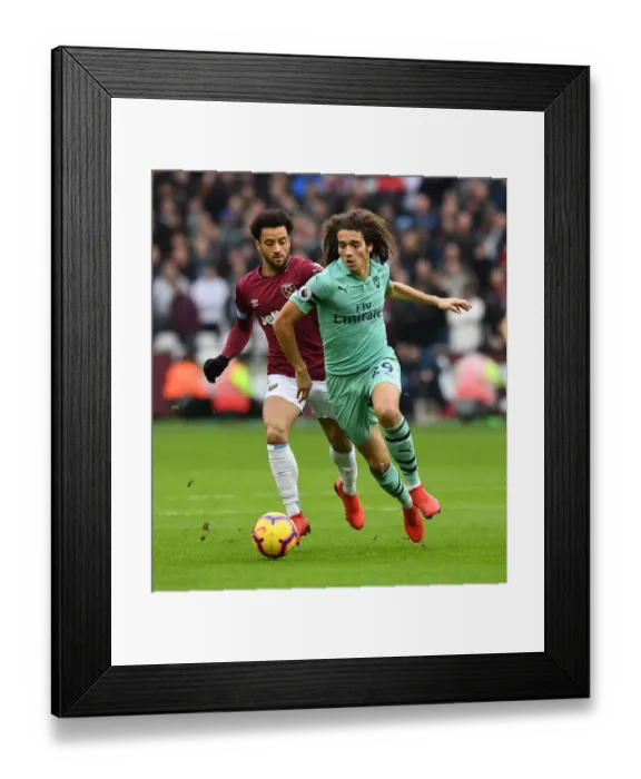 Framed Print : Guendouzi vs. Anderson: Battle in the Premier League - West Ham United vs. Arsenal FC Framed Print : Guendouzi vs. Anderson: Battle in the Premier League - West Ham United vs. Arsenal FC