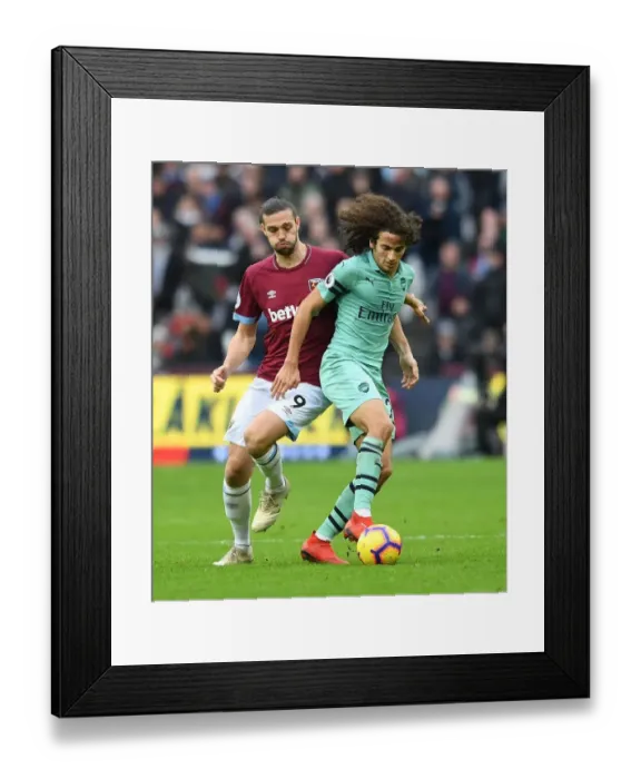Framed Print : Guendouzi vs. Carroll: Battle in the Premier League - West Ham United vs. Arsenal FC