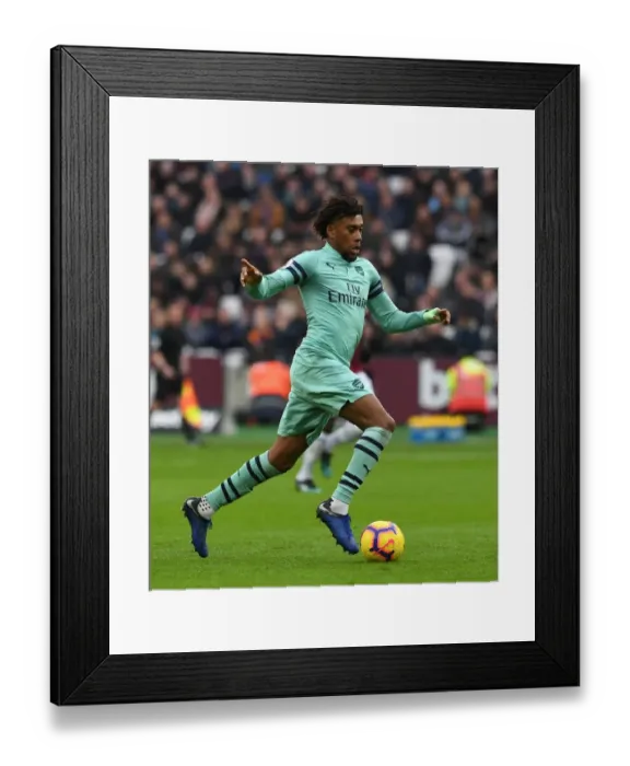 Framed Print : Alex Iwobi in Action: West Ham United vs. Arsenal FC, Premier League 2018-19 Framed Print : Alex Iwobi in Action: West Ham United vs. Arsenal FC, Premier League 2018-19