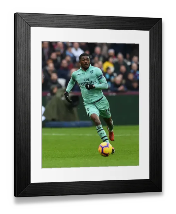 Framed Print : Ainsley Maitland-Niles in Action: West Ham United vs. Arsenal FC, Premier League 2018-19