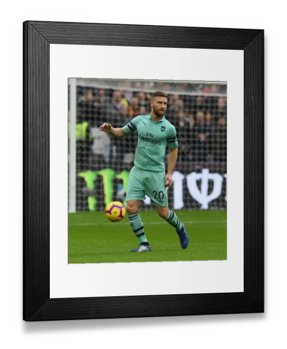 Framed Print : Mustafi in Action: West Ham United vs. Arsenal FC, Premier League