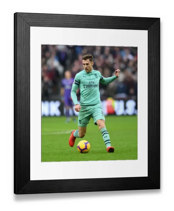 Framed Print : Aaron Ramsey in Action: Arsenal vs. West Ham United, Premier League 2018-19 Framed Print : Aaron Ramsey in Action: Arsenal vs. West Ham United, Premier League 2018-19