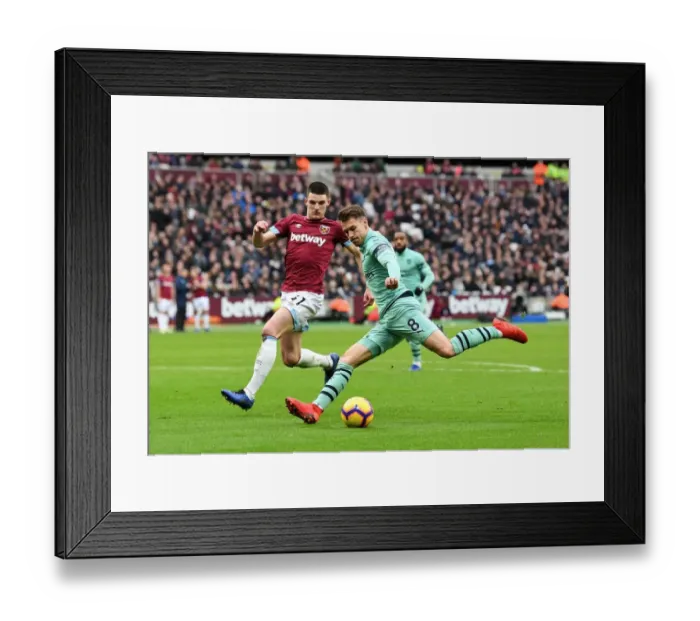 Framed Print : Intense Rivalry: Ramsey vs. Rice in the London Derby - West Ham United vs. Arsenal FC Framed Print : Intense Rivalry: Ramsey vs. Rice in the London Derby - West Ham United vs. Arsenal FC