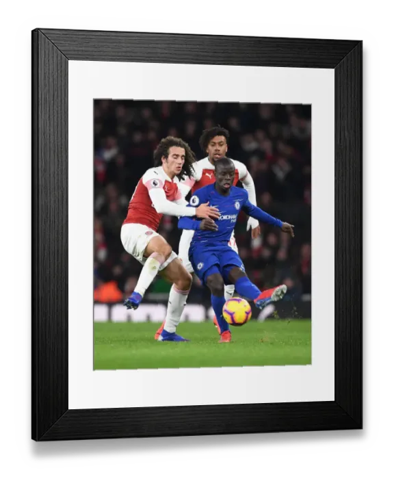 Framed Print : Guendouzi vs. Kante: A Premier League Battle at Emirates Stadium Framed Print : Guendouzi vs. Kante: A Premier League Battle at Emirates Stadium