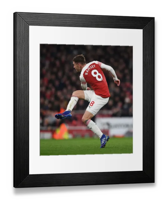 Framed Print : Arsenal's Aaron Ramsey Faces Off Against Chelsea in the Premier League
