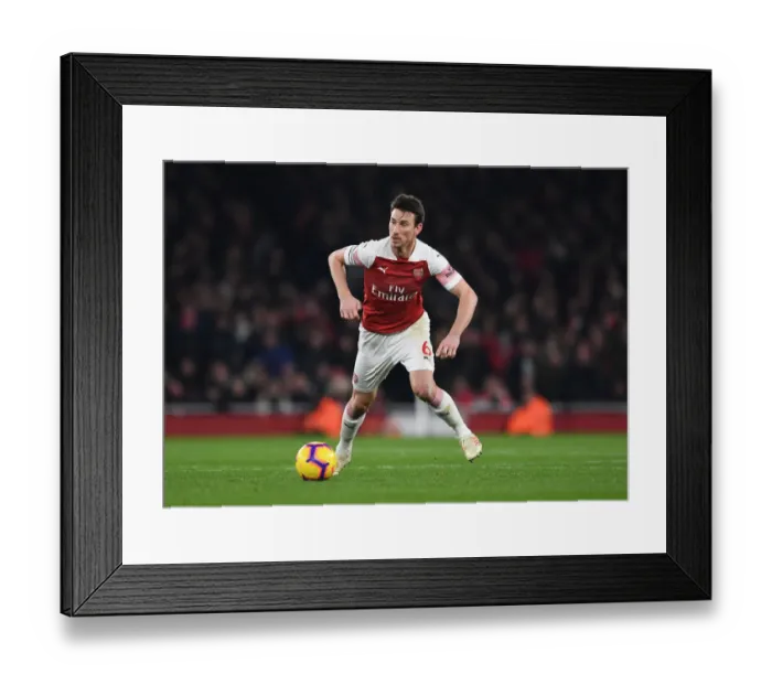 Framed Print : Arsenal's Koscielny Faces Off Against Chelsea in Premier League Showdown Framed Print : Arsenal's Koscielny Faces Off Against Chelsea in Premier League Showdown