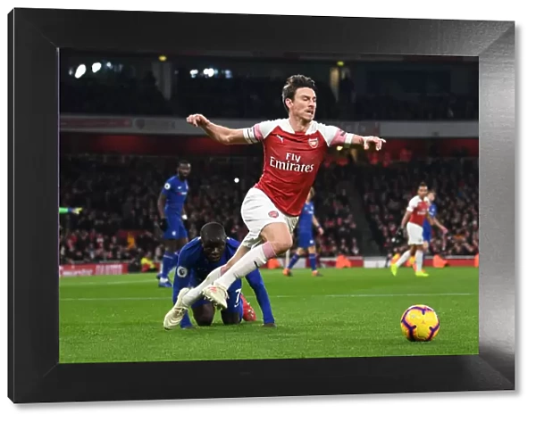 Intense Rivalry: Kante Trips Koscielny in Arsenal vs. Chelsea Clash (Premier League 2018-19)