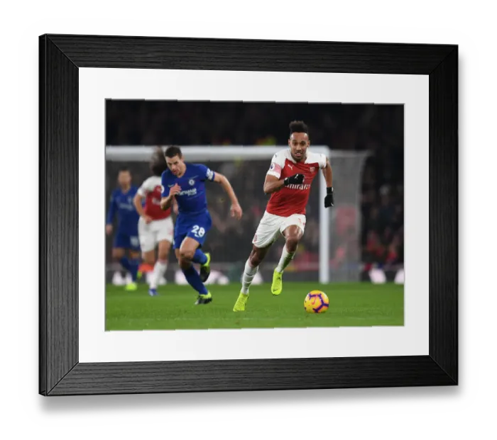 Framed Print : Arsenal's Aubameyang Faces Off Against Chelsea in Intense Premier League Showdown Framed Print : Arsenal's Aubameyang Faces Off Against Chelsea in Intense Premier League Showdown