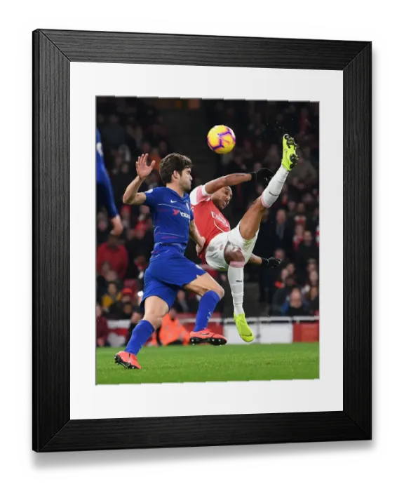 Framed Print : Arsenal's Aubameyang Goes for Overhead Kick Against Chelsea in Premier League Clash