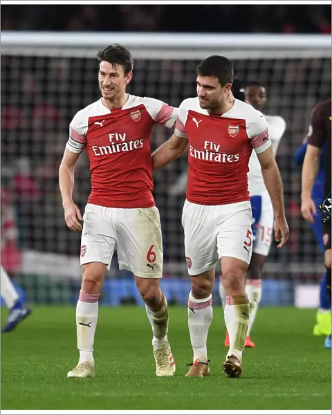 Arsenal's Koscielny and Sokratis Celebrate after Arsenal FC vs Chelsea FC, Premier League 2018-19