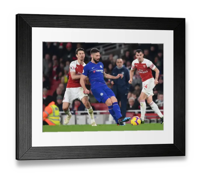 Framed Print : Arsenal vs. Chelsea: Koscielny Closes In on Giroud in Intense Premier League Clash Framed Print : Arsenal vs. Chelsea: Koscielny Closes In on Giroud in Intense Premier League Clash