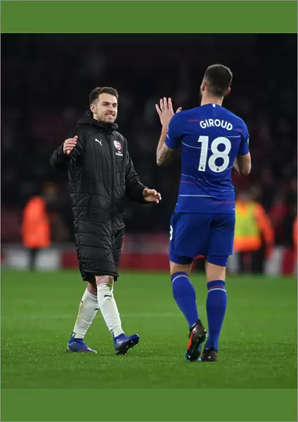 Arsenal Rivals Turned Teammates: Ramsey and Giroud's Unity After Intense Arsenal vs. Chelsea Clash (2018-19)