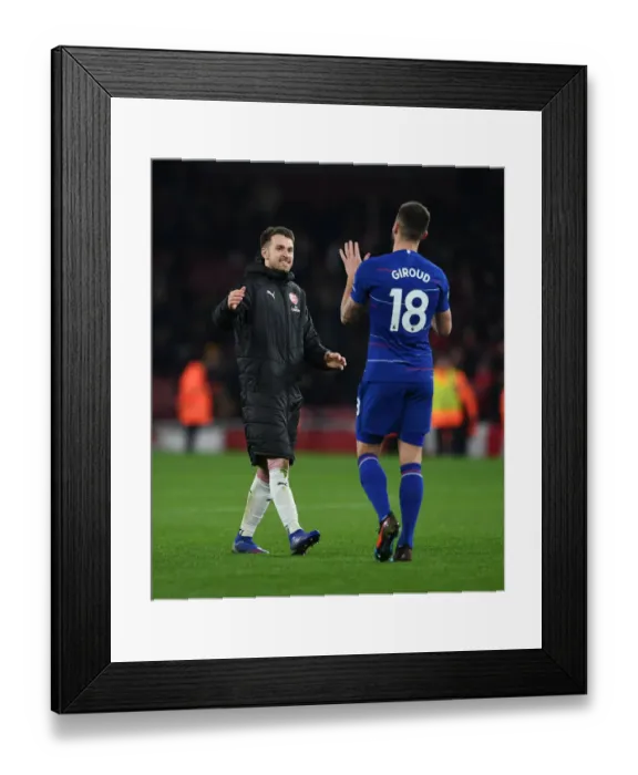 Framed Print : Arsenal Rivals Turned Teammates: Ramsey and Giroud's Unity After Intense Arsenal vs. Chelsea Clash (2018-19) Framed Print : Arsenal Rivals Turned Teammates: Ramsey and Giroud's Unity After Intense Arsenal vs. Chelsea Clash (2018-19)