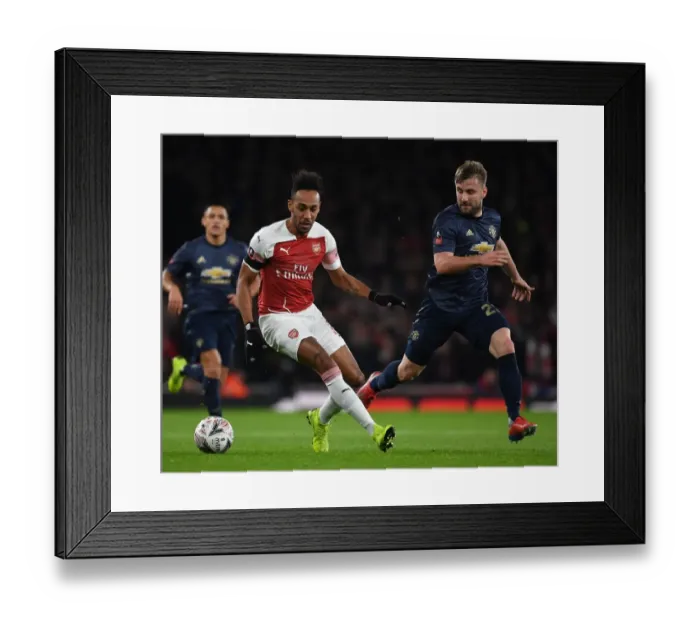 Framed Print : Arsenal's Aubameyang Clashes with Shaw in FA Cup Battle at Emirates Stadium: Arsenal vs Manchester United Framed Print : Arsenal's Aubameyang Clashes with Shaw in FA Cup Battle at Emirates Stadium: Arsenal vs Manchester United