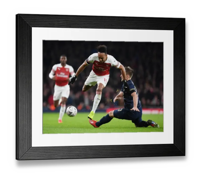 Framed Print : Arsenal vs Manchester United: Aubameyang vs Shaw Showdown - FA Cup Clash at Emirates Stadium