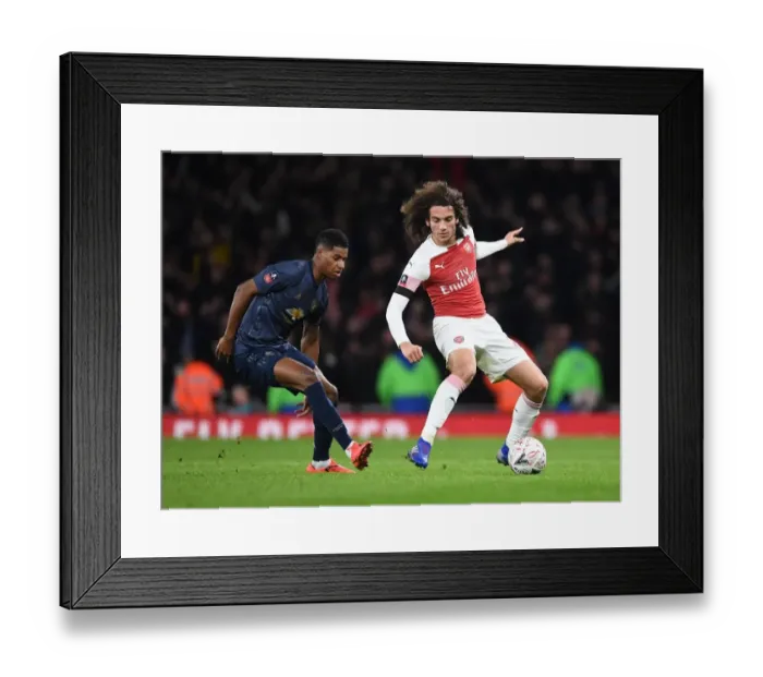 Framed Print : Arsenal vs Manchester United: Guendouzi vs Rashford Clash in FA Cup Fourth Round
