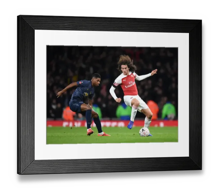 Framed Print : Guendouzi vs Rashford: A FA Cup Showdown - Arsenal vs Manchester United's Titanic Battle