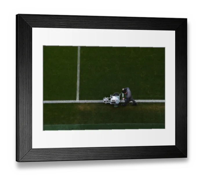 Framed Print : Arsenal Groundsman: Battle Preparation for Arsenal vs Manchester United FA Cup Match Framed Print : Arsenal Groundsman: Battle Preparation for Arsenal vs Manchester United FA Cup Match