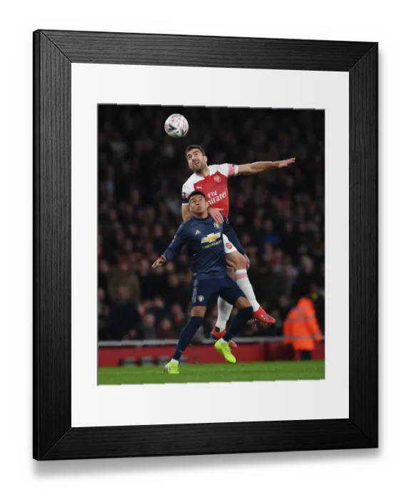 Framed Print : Battle of the Midfield: Sokratis vs. Lingard - Arsenal vs. Manchester United FA Cup Clash Framed Print : Battle of the Midfield: Sokratis vs. Lingard - Arsenal vs. Manchester United FA Cup Clash