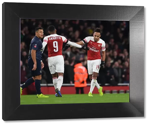 Arsenal's Aubameyang and Lacazette Celebrate Goal Against Manchester United in FA Cup Fourth Round