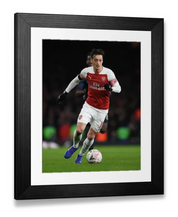 Framed Print : FA Cup Showdown: Arsenal vs Manchester United - Ozil's Leadership: A Battle of Football Giants Framed Print : FA Cup Showdown: Arsenal vs Manchester United - Ozil's Leadership: A Battle of Football Giants