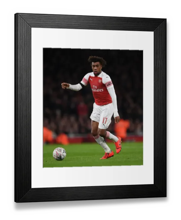 Framed Print : Arsenal's Alex Iwobi in the Spotlight: Arsenal vs Manchester United FA Cup Clash