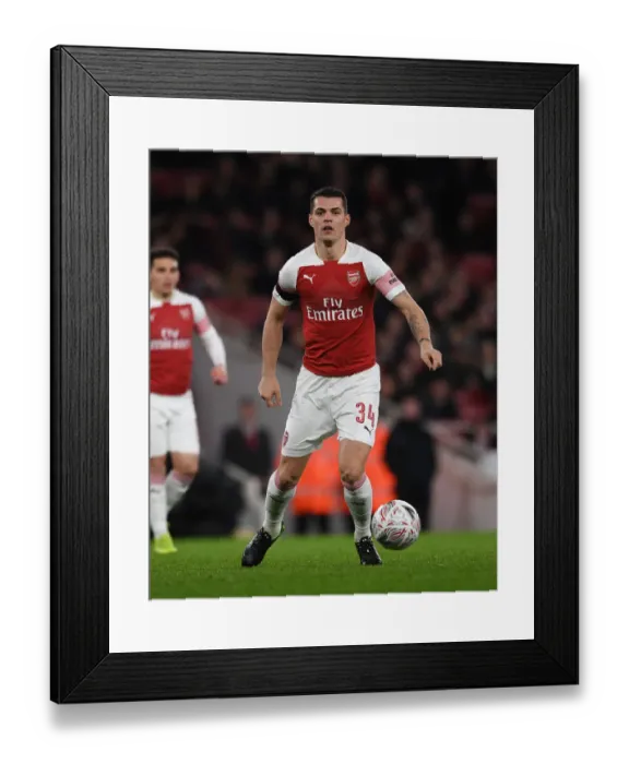 Framed Print : Arsenal's Granit Xhaka in FA Cup Clash Against Manchester United Framed Print : Arsenal's Granit Xhaka in FA Cup Clash Against Manchester United
