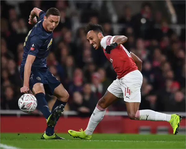 Arsenal's Aubameyang Outmaneuvers Manchester United's Matic in FA Cup Clash