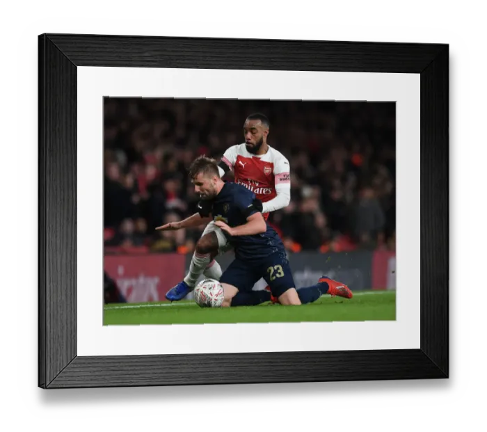 Framed Print : Arsenal vs Manchester United: Lacazette vs Shaw in FA Cup Clash at Emirates Stadium Framed Print : Arsenal vs Manchester United: Lacazette vs Shaw in FA Cup Clash at Emirates Stadium
