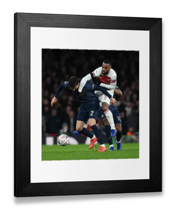 Framed Print : Lacazette vs Lindelof: A FA Cup Showdown at the Emirates