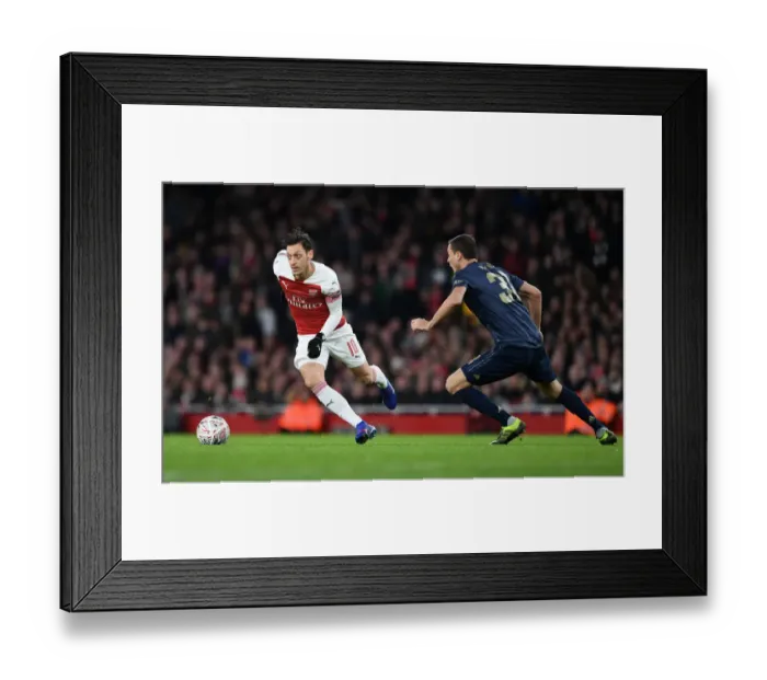 Framed Print : Arsenal vs Manchester United: Clash of Titans in the FA Cup Fourth Round - Ozil vs Matic Battle