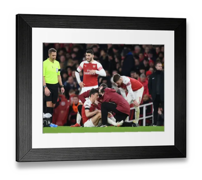 Framed Print : Arsenal v Manchester United: Koscielny Injured in FA Cup Clash Framed Print : Arsenal v Manchester United: Koscielny Injured in FA Cup Clash