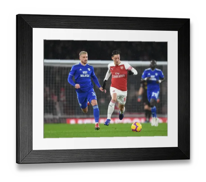 Framed Print : Arsenal's Mesut Ozil Scores Past Cardiff's Joe Bennett - Arsenal FC vs Cardiff City, Premier League 2018-19 Framed Print : Arsenal's Mesut Ozil Scores Past Cardiff's Joe Bennett - Arsenal FC vs Cardiff City, Premier League 2018-19