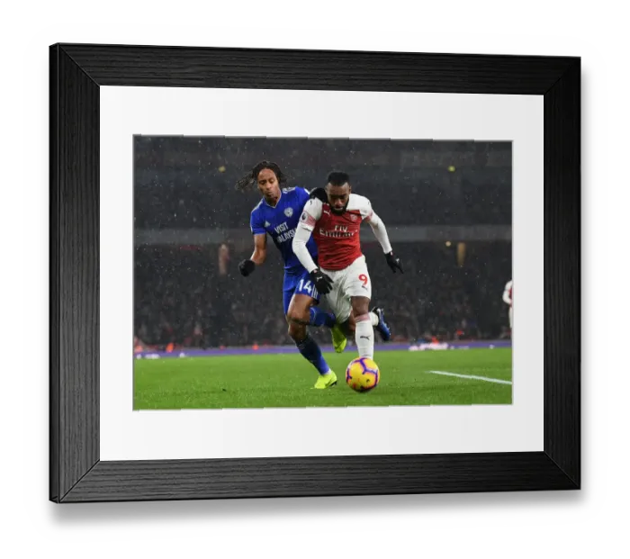 Framed Print : Arsenal vs. Cardiff: Lacazette Faces Off Against Reid in Premier League Clash Framed Print : Arsenal vs. Cardiff: Lacazette Faces Off Against Reid in Premier League Clash