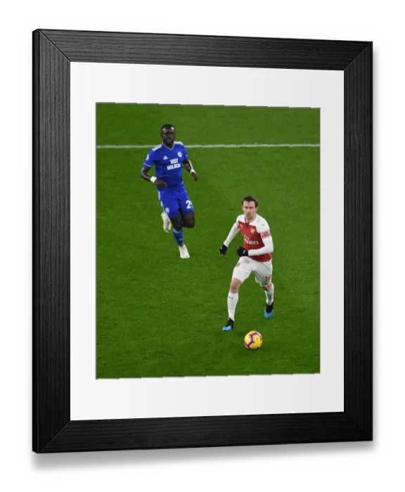 Framed Print : Arsenal vs. Cardiff: Monreal Clashes with Niasse in Premier League Showdown