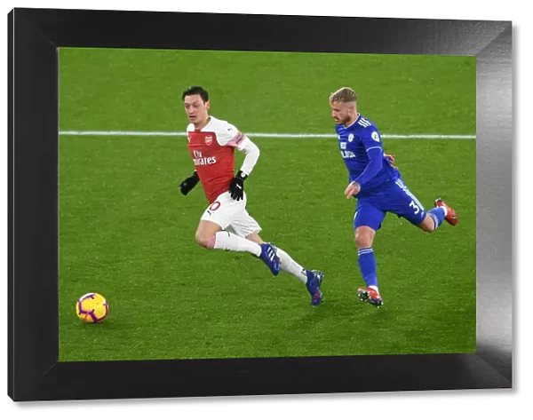 Intense Clash: Ozil vs. Bennett in Arsenal's Battle Against Cardiff