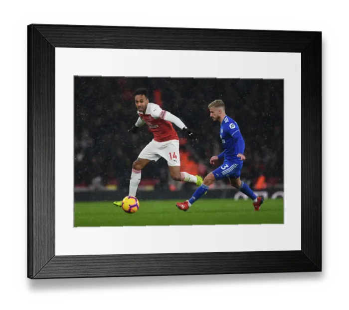Framed Print : Arsenal's Aubameyang Faces Off Against Cardiff's Bennett in Premier League Clash Framed Print : Arsenal's Aubameyang Faces Off Against Cardiff's Bennett in Premier League Clash