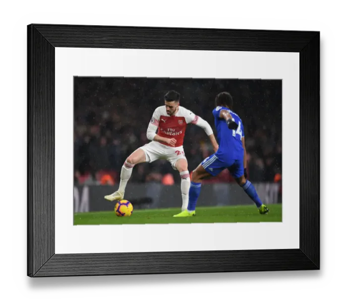Framed Print : Arsenal vs. Cardiff: Jenkinson Clashes with Reid in Premier League Showdown