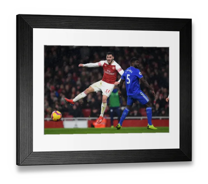 Framed Print : Arsenal's Sead Kolasinac Faces Off Against Cardiff's Bruno Ecuele Manga in Intense Premier League Showdown