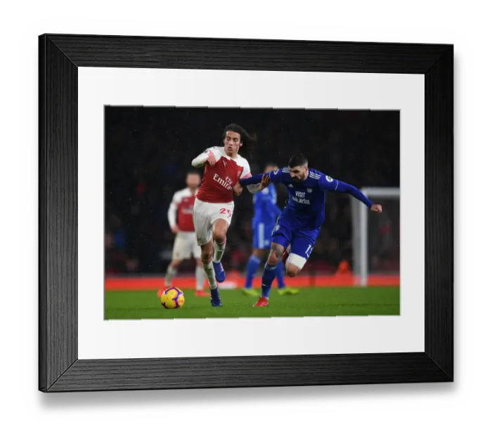 Framed Print : Intense Battle: Guendouzi vs. Paterson in Arsenal's Premier League Clash against Cardiff
